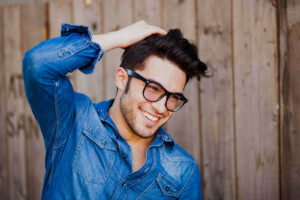 Smiling man showing a healthy, white smile after ICON white spot removal treatment