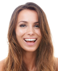 Smiling woman showcasing a bright white smile for Rittenhouse Smiles Free Whitening for Life program